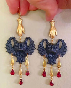 golden hand black cat earrings